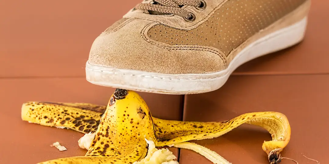 Why Review Sites are dangerous for Your Business shown through a shoe stepping on a banana peel, symbolizing hidden risks and pitfalls