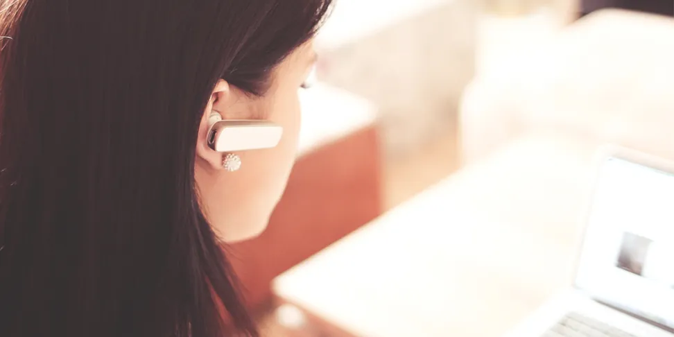 Customer care support representative assisting customers as part of a marketing strategy